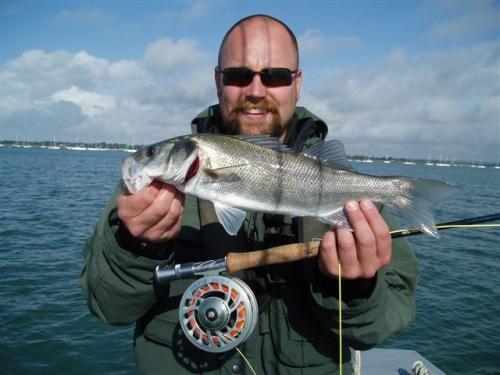 Adam with an early June fish.., 2007