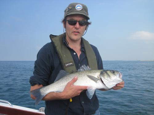 Richard White with a nice plump August Bass...., 2013