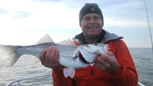 Ian Griffiths with his 1st fly caught Sea Bass, 2015