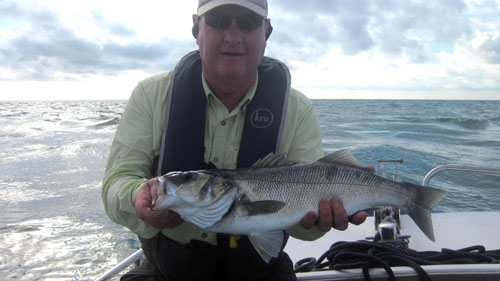 Michael Langford with a nice August Bass, 2017