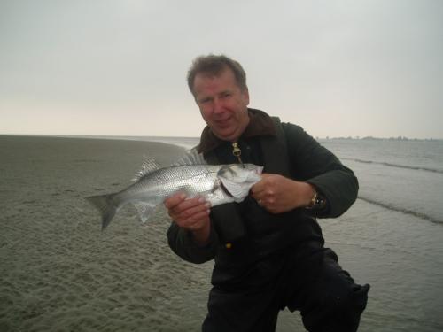 Jeremy Burbidge with a fin perfect October Bass, 2006